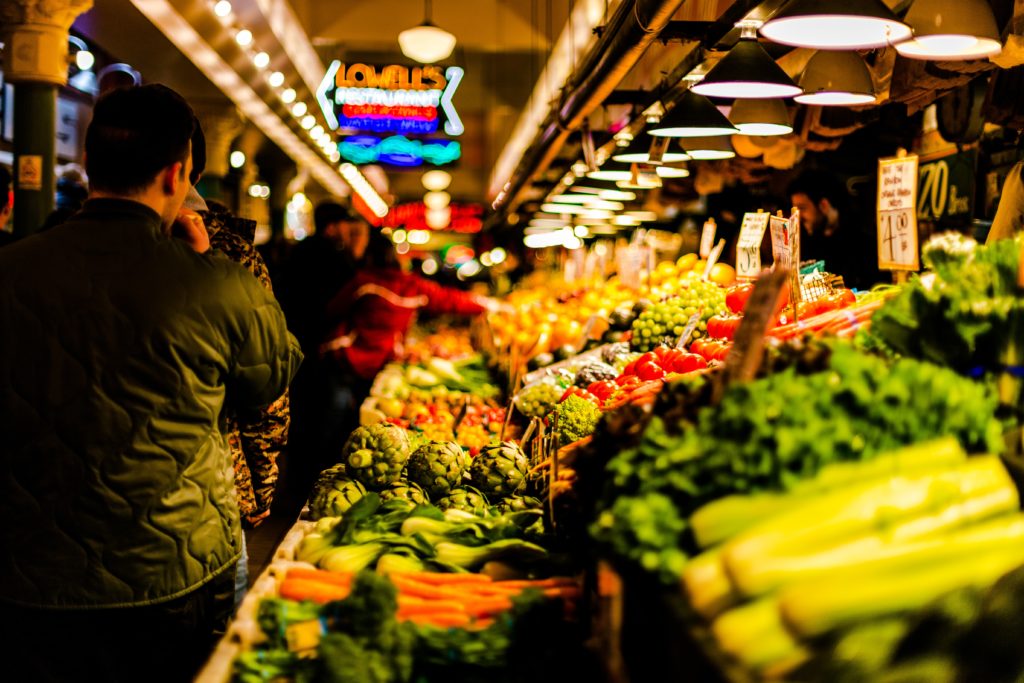 People in a grocery store. Photo by Thomas Le on Unsplash