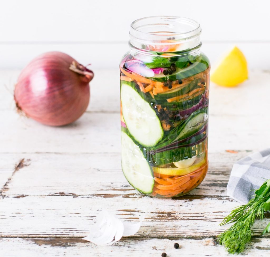 Glass jar with fermented vegetables.