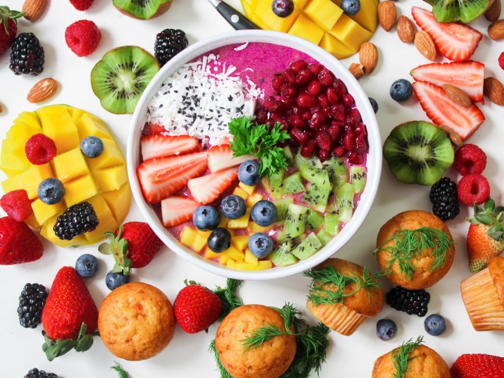 Various healthy fruits and vegetables in a bowl