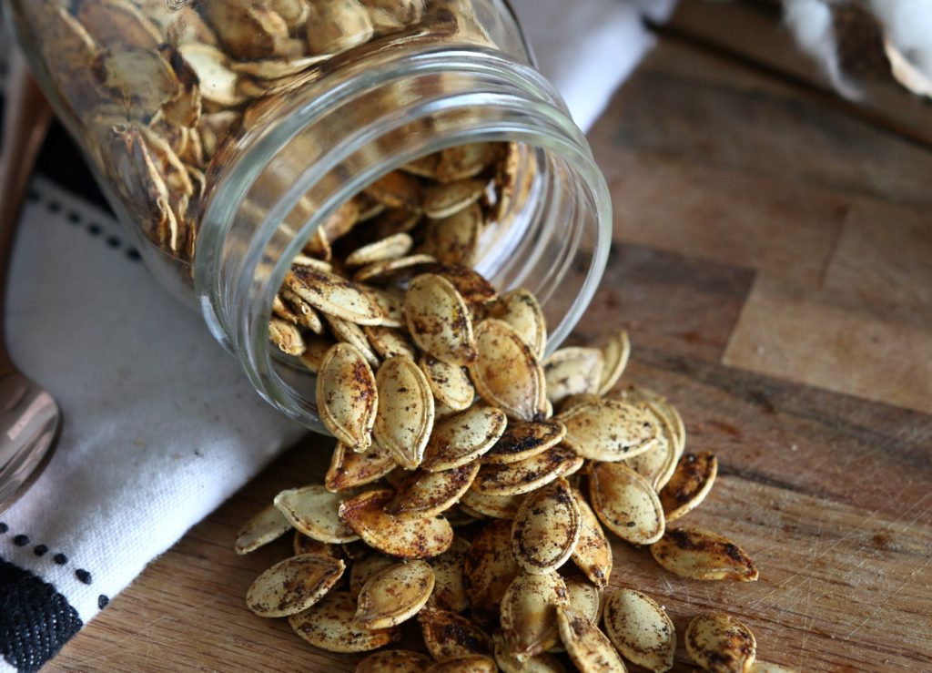 Pumpkin seeds that have been roasted in the oven with sugar and cinnamon.