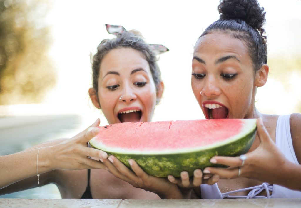 People eating watermelon, before fasting.