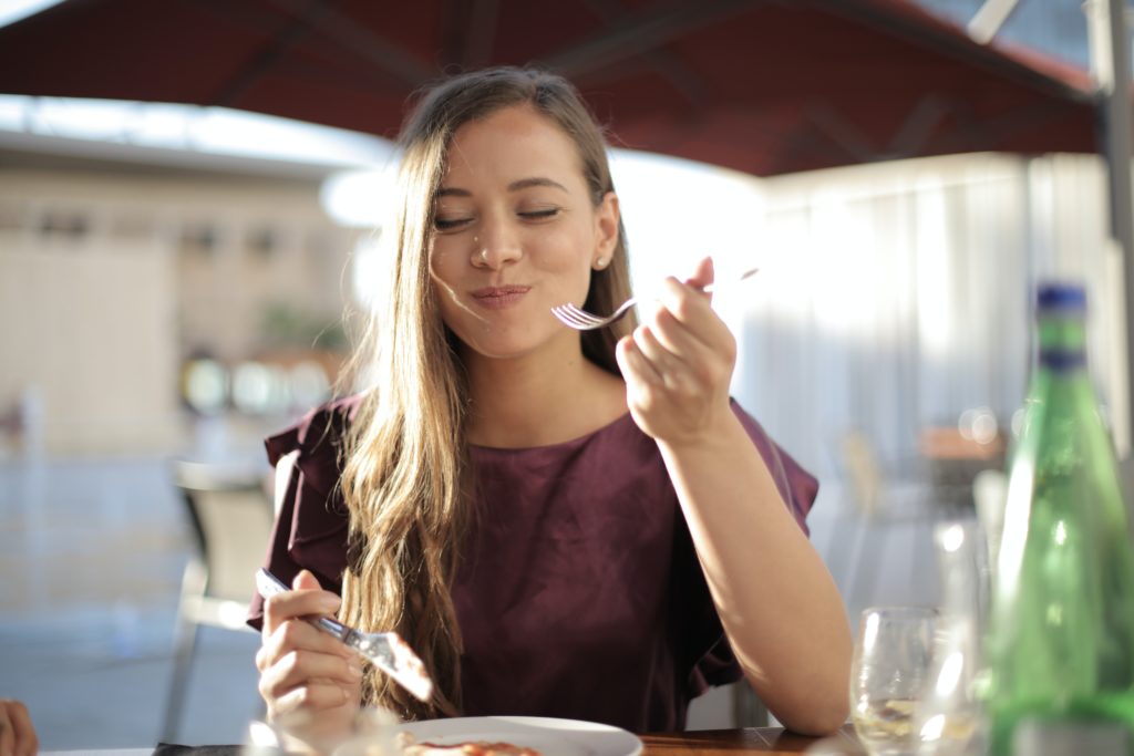 Woman eating well.