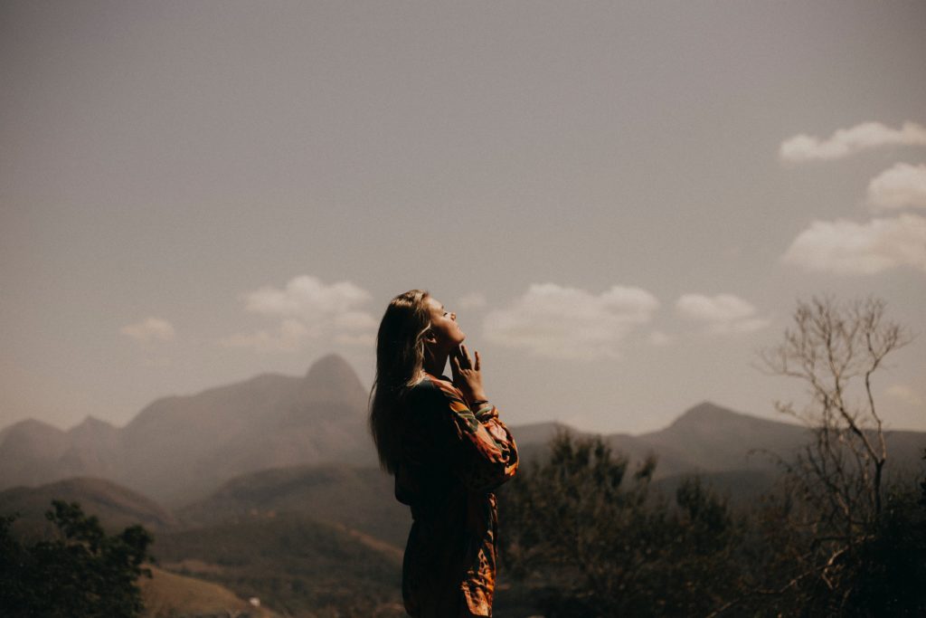 Person meditating mindfully.