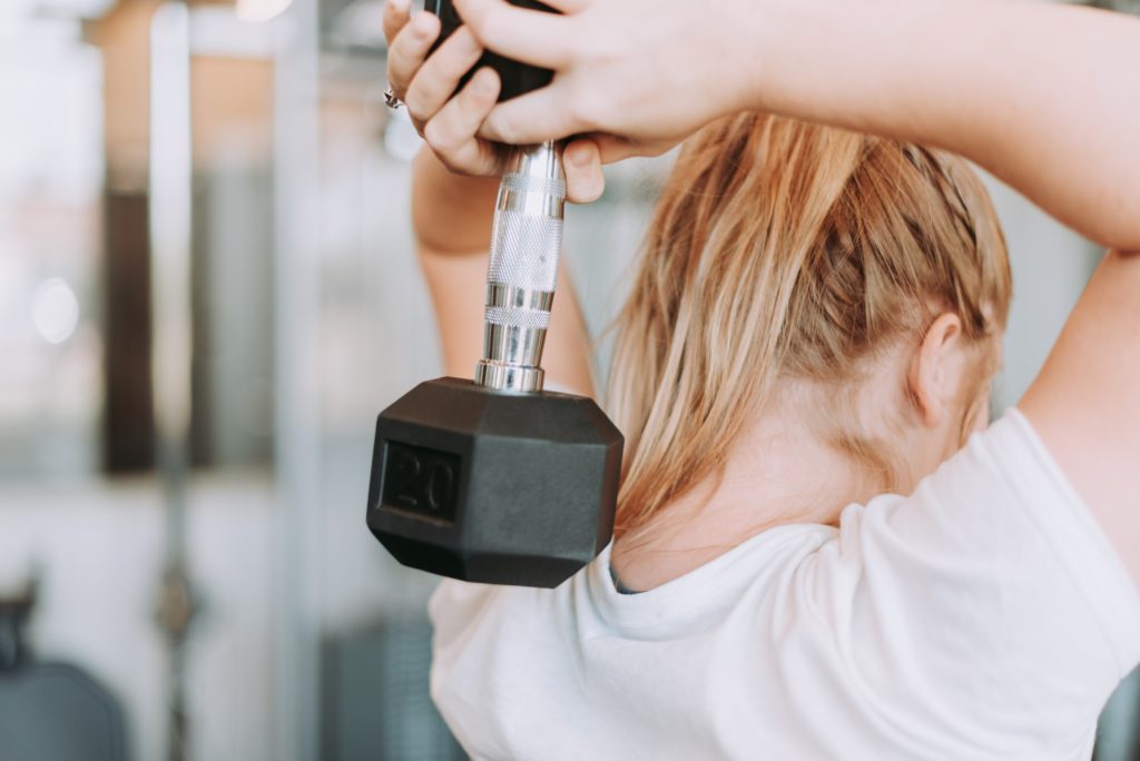 Woman holding a weight 