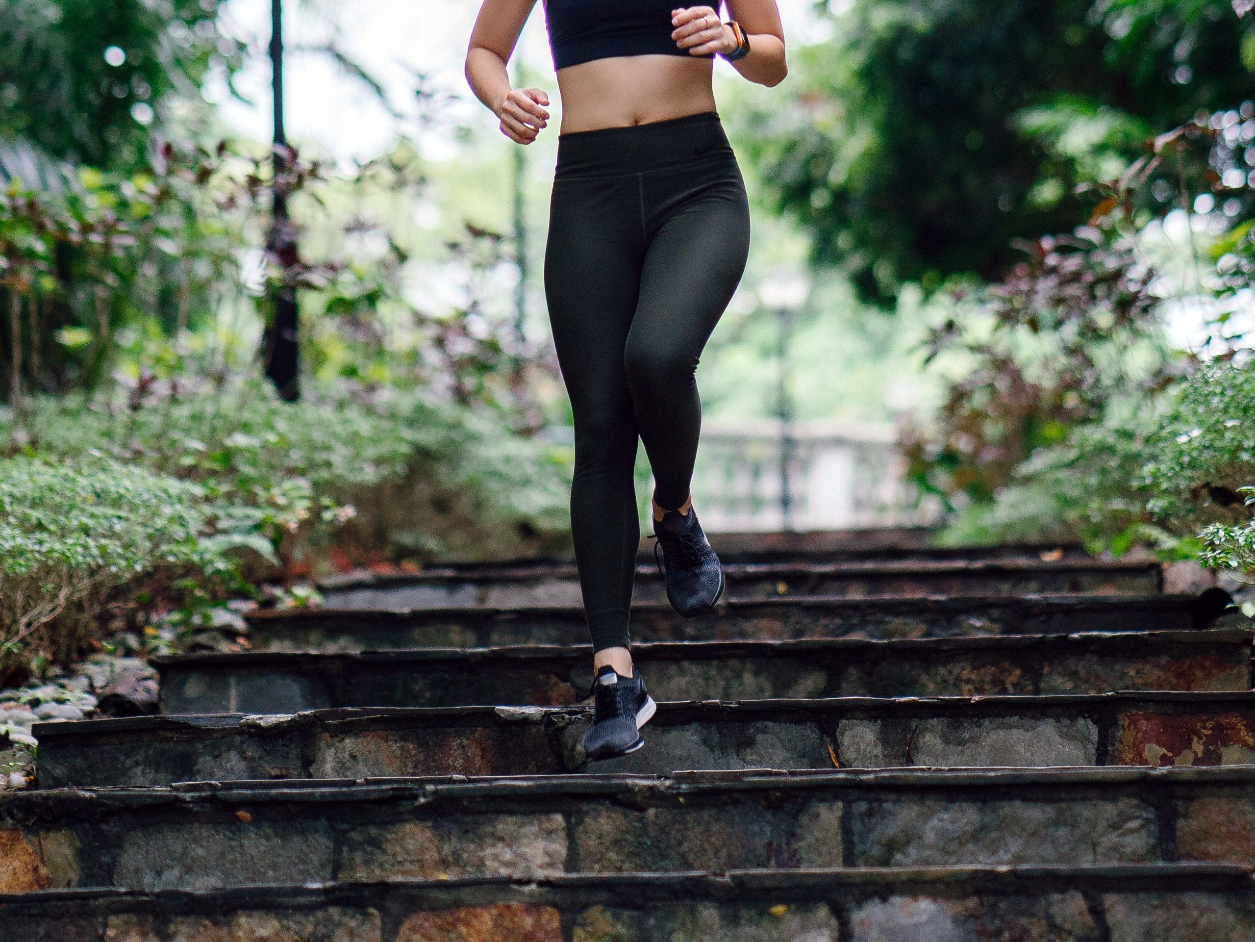 woman running down stairs