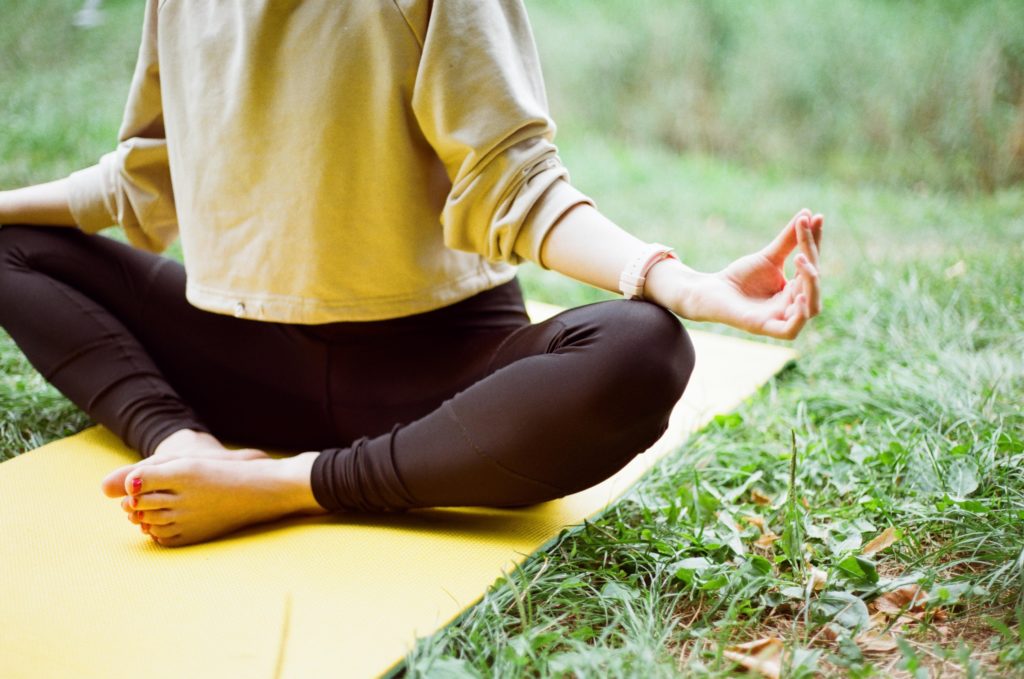 person practicing yoga for the brain