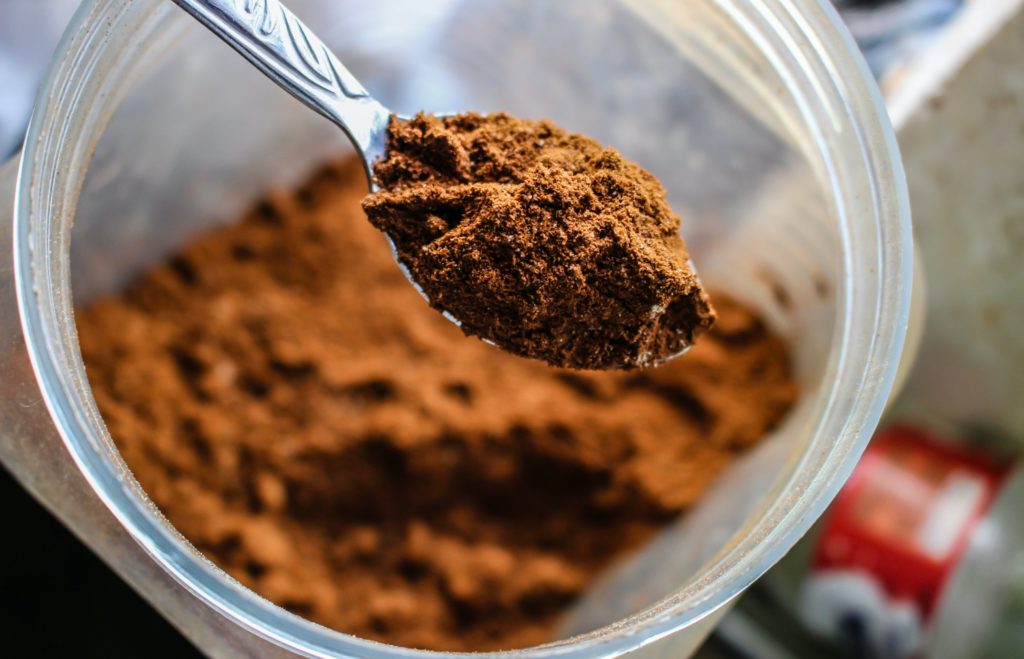 spoonful of brown powder, carob